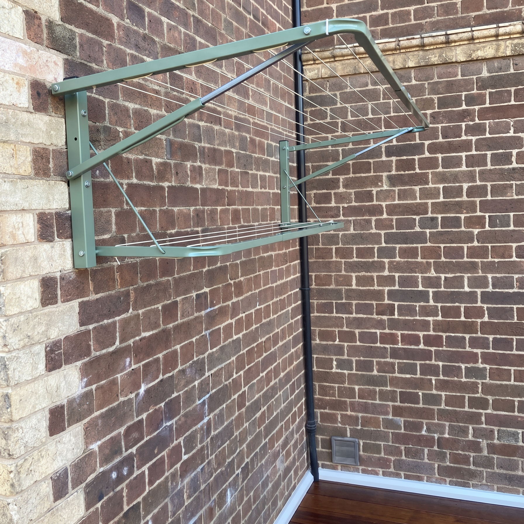 wall clothesline in a modern backyard