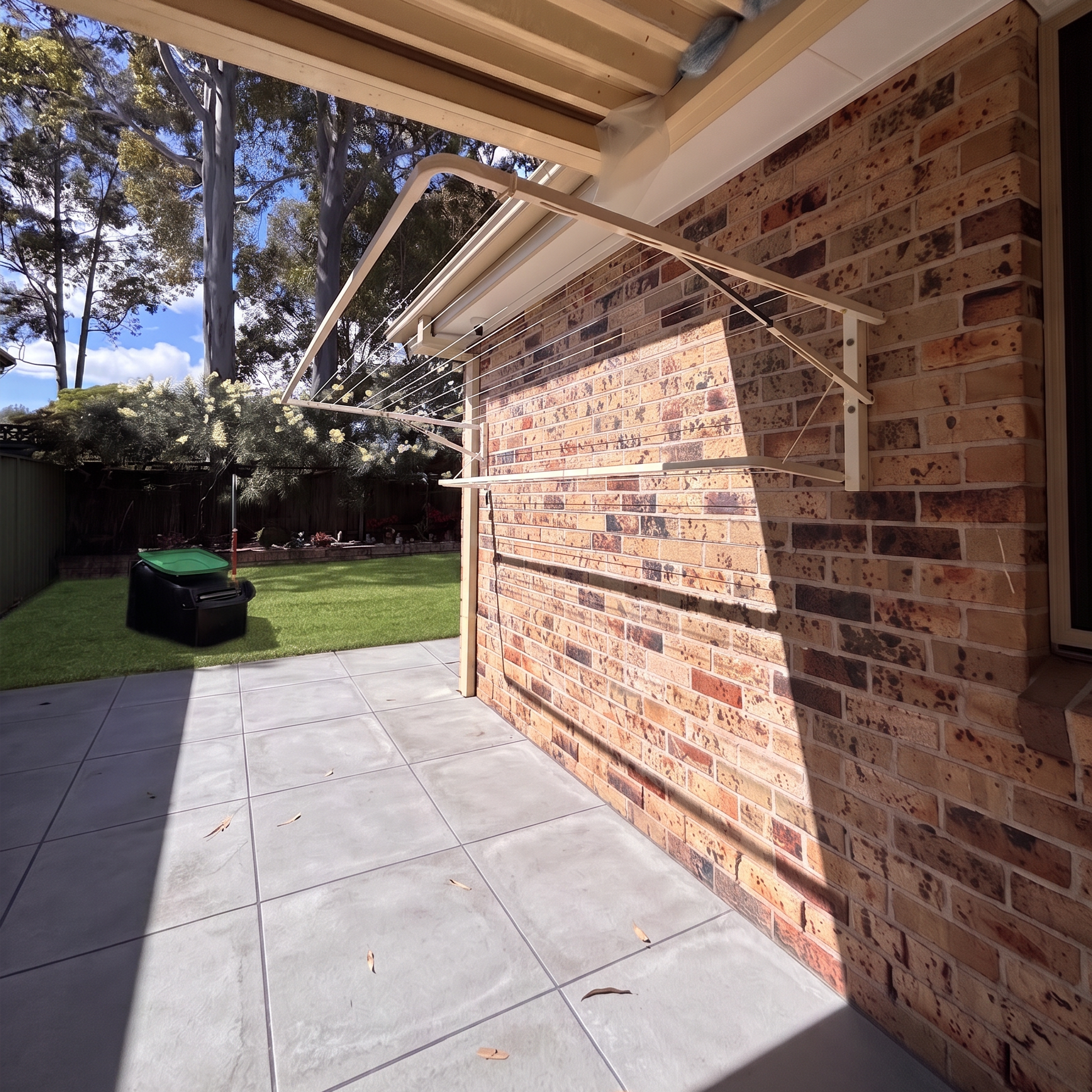 wall clothesline in a modern backyard