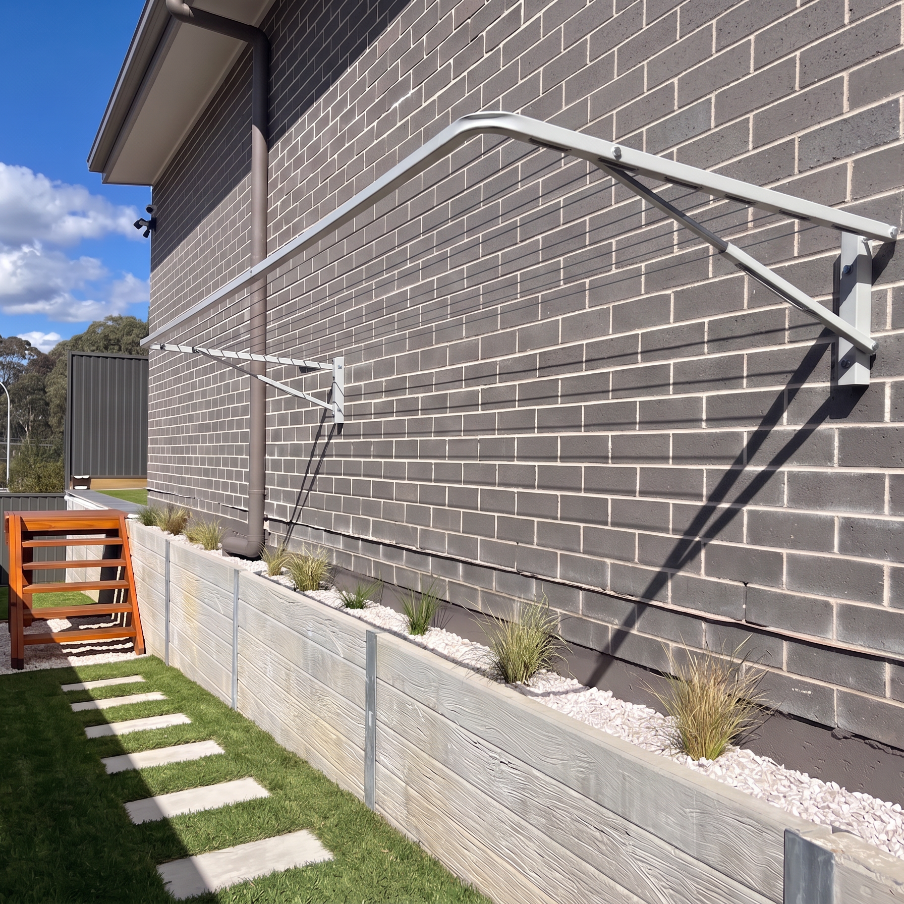 wall clothesline in a modern backyard